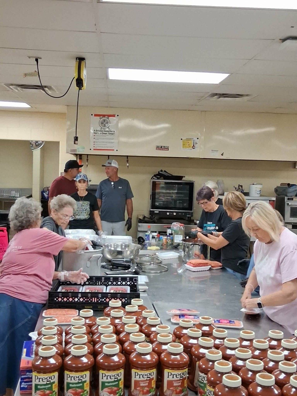 LoveZagna volunteers preparing meals together